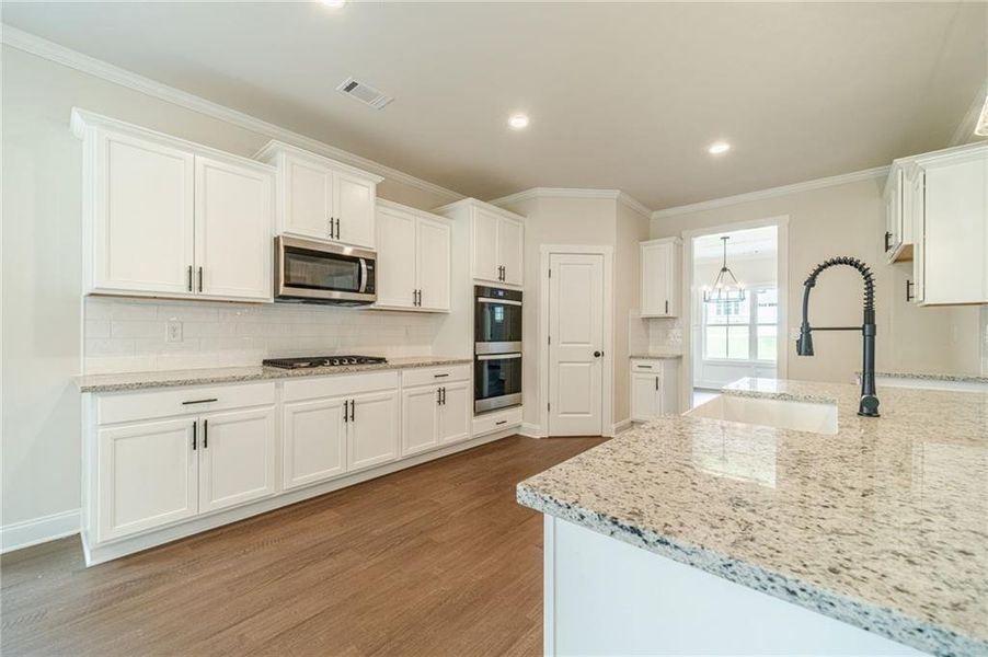 Furnished interior view inside a new home in , Covington (Image 7).