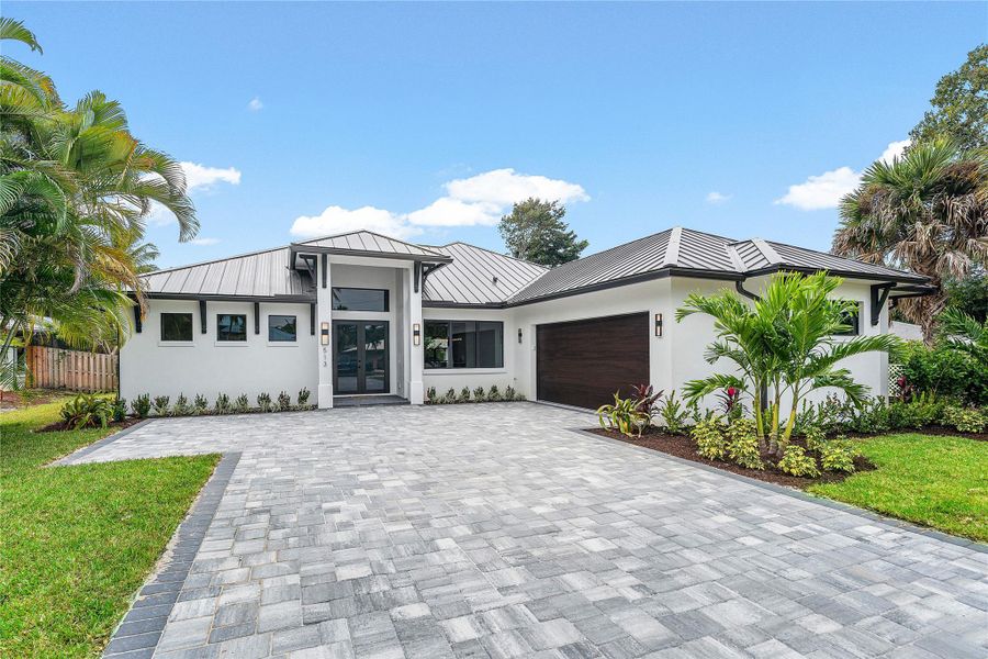 Front exterior of a new home in , Stuart, FL, highlighting curb appeal (Image 19).