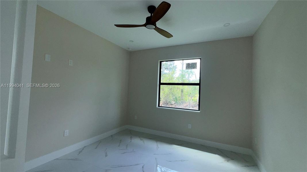 Spacious, unfurnished interior of a new home in , Lehigh Acres (Image 13).