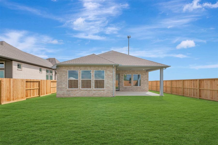 Exterior details and patio area of a home in Jordan Ranch - Terrace Collection, Fulshear (Image 25).