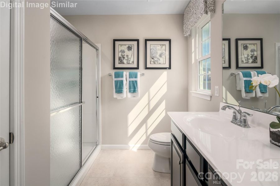 Love the ensuite bath! Sunlight pours in, the walk-in shower sparkles — it’s your daily dose of luxury and light! Love the ensuite bath! Sunlight pours in, the walk-in shower sparkles — it’s your daily dose of luxury and light!