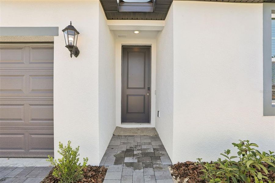Exterior details and patio area of a home in Crosswinds - Signature Series, Haines City (Image 21).