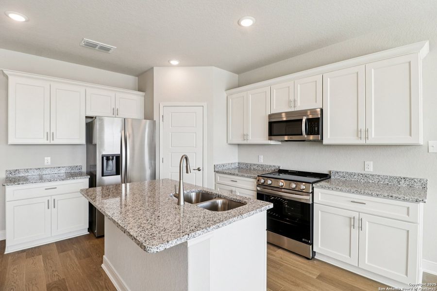 Furnished interior view inside a new home in Magnolia Village North, San Antonio (Image 30).