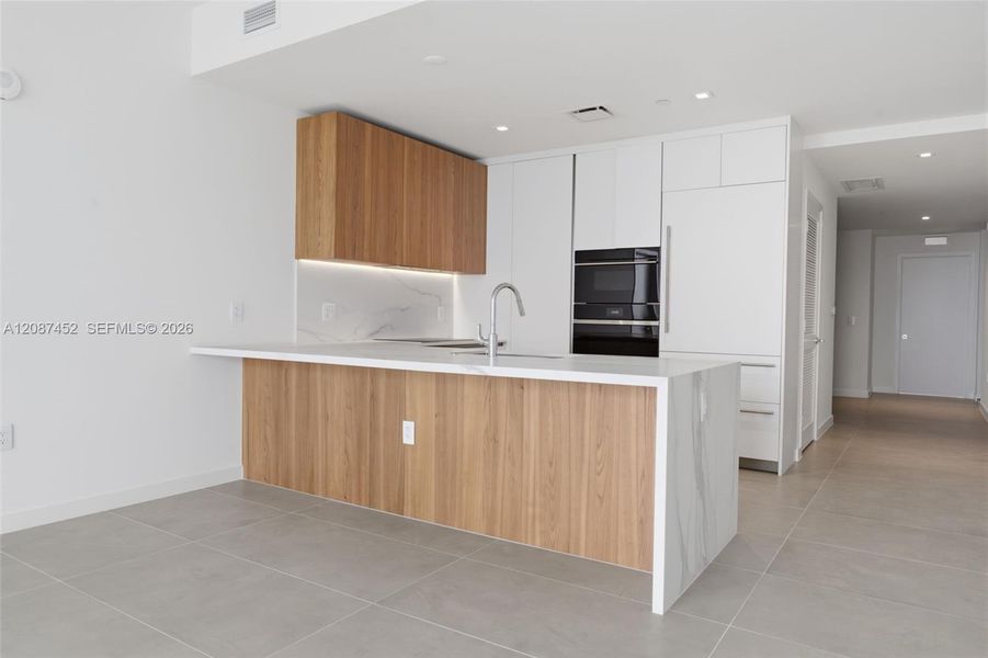 Furnished interior view inside a new home in , Miami (Image 8).