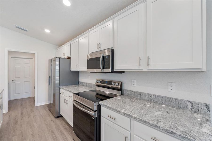 Furnished interior view inside a new home in Aviary at Rutland Ranch, Parrish (Image 15).