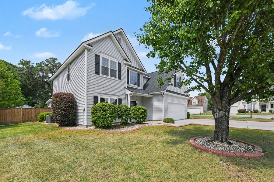 Front exterior of a new home in , North Charleston, SC, highlighting curb appeal (Image 24).