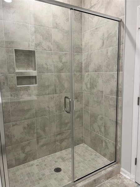 Primary bath with tile shower