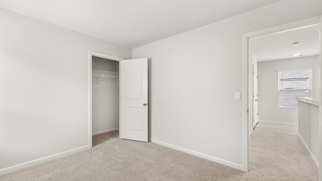 Representative unfurnished interior of a home built from the Somerset by D.R. Horton in Highland Hills, Graniteville (Image 19).
