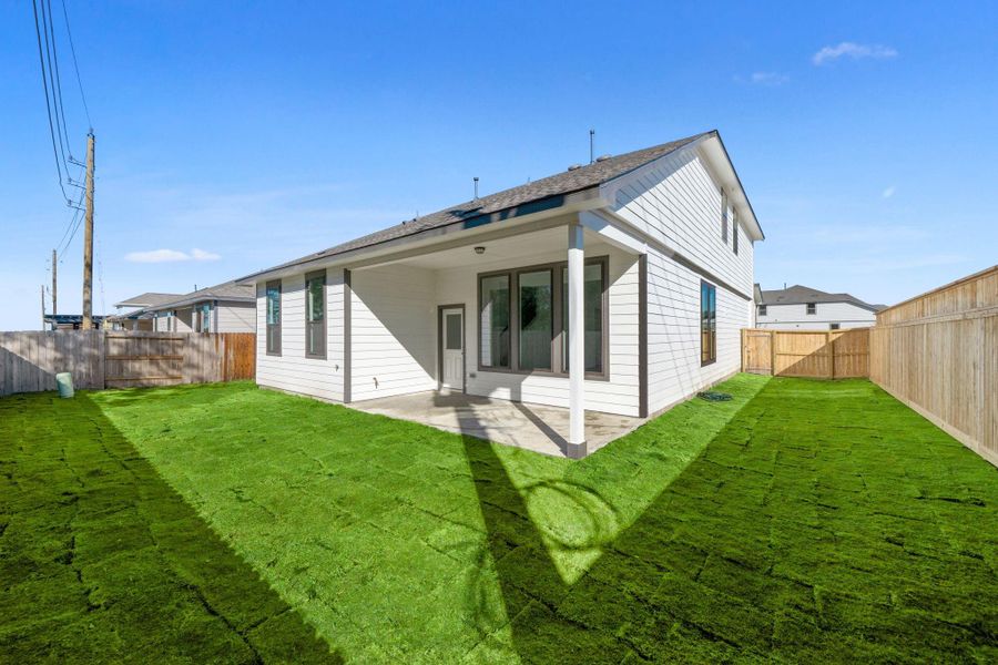 This backyard is perfect for family gatherings, social events, or simply unwinding in the fresh air. This backyard is perfect for family gatherings, social events, or simply unwinding in the fresh air.