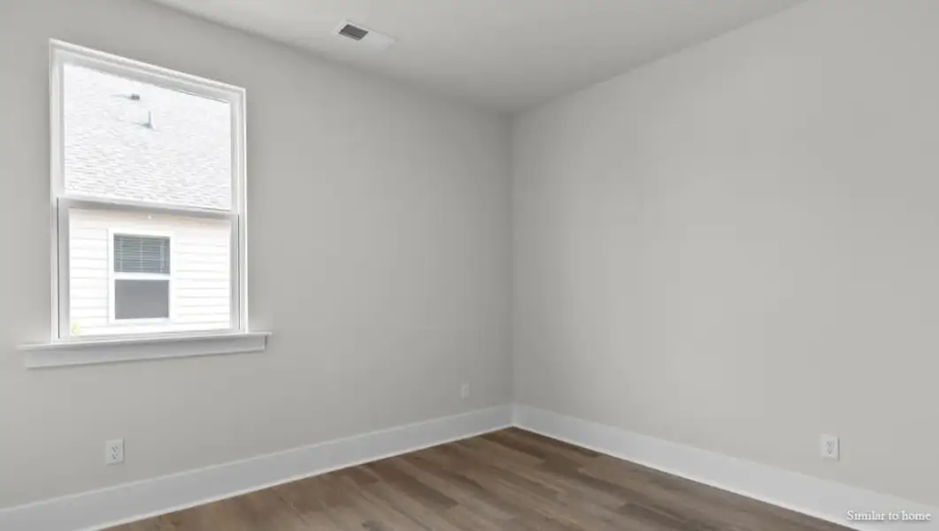 Spacious, unfurnished interior of a new home in The Highlands at Cedar Hill Landing, Navassa (Image 34).