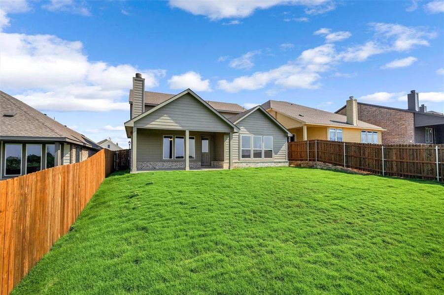 Front exterior of a new home in Liberty Pointe, Gainesville, TX, highlighting curb appeal (Image 25). Front exterior of a new home in Liberty Pointe, Gainesville, TX, highlighting curb appeal (Image 25).