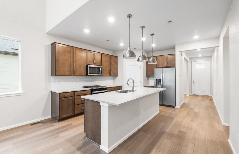 Furnished interior view inside a new home in Harvest Crossing, Aurora (Image 12).