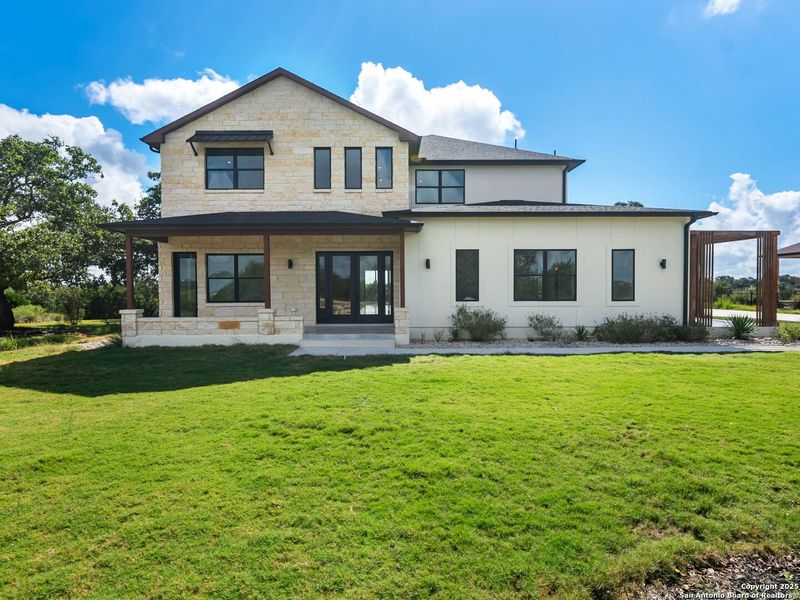 Front exterior of a new home in , Spring Branch, TX, highlighting curb appeal (Image 26).