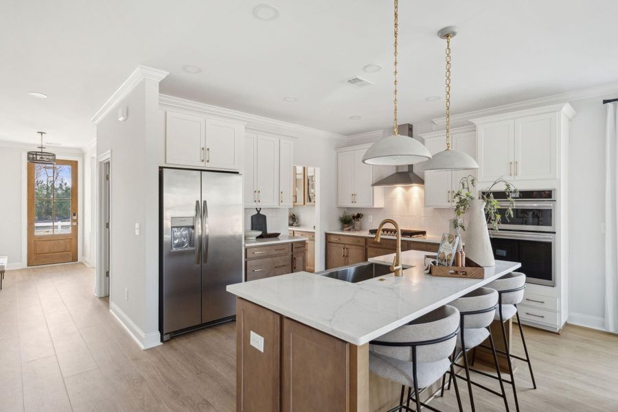 Furnished interior view inside a new home in Tidewater at Lakes of Cane Bay, Summerville (Image 22).