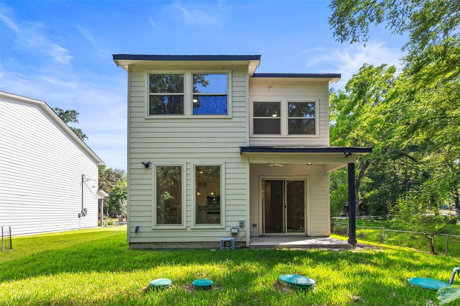 Exterior details and patio area of a home in , Conroe (Image 16).