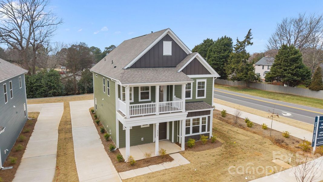 Front exterior of a new home in Arbor Village, Matthews, NC, highlighting curb appeal (Image 19).