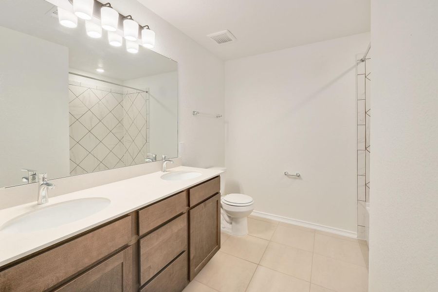 Furnished interior view inside a new home in Stoney Chase, Del Valle (Image 12).