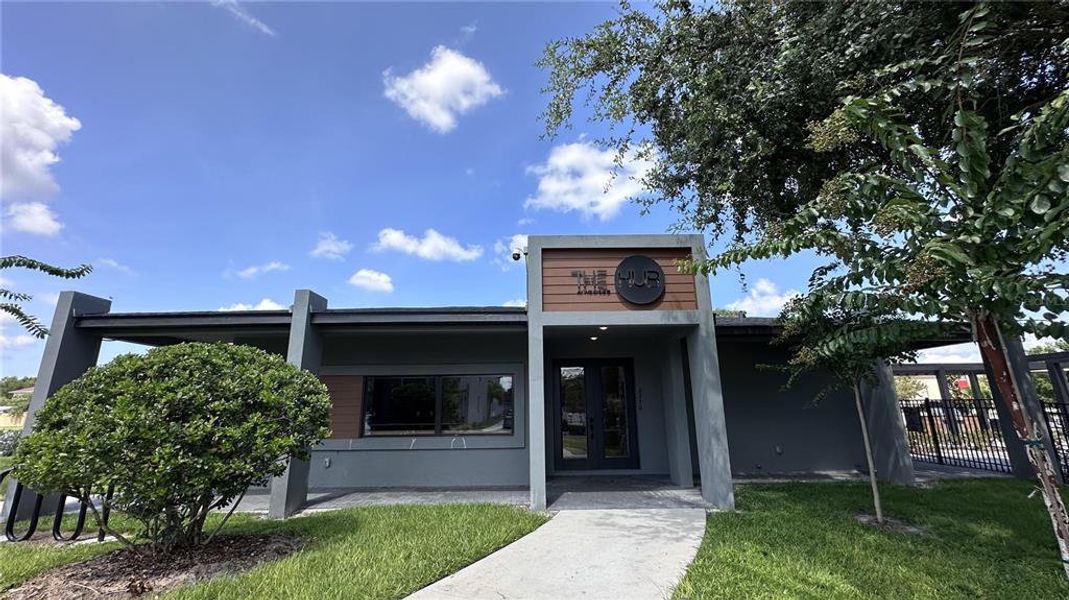 Front exterior of a new home in , Kissimmee, FL, highlighting curb appeal (Image 21).