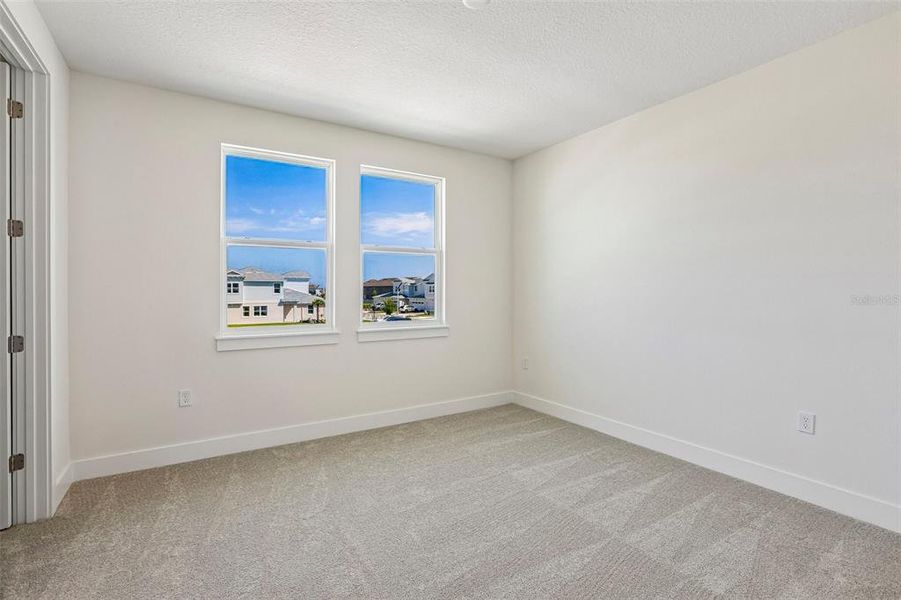 Spacious, unfurnished interior of a new home in Lagoon Residences at Epperson, Wesley Chapel (Image 17).