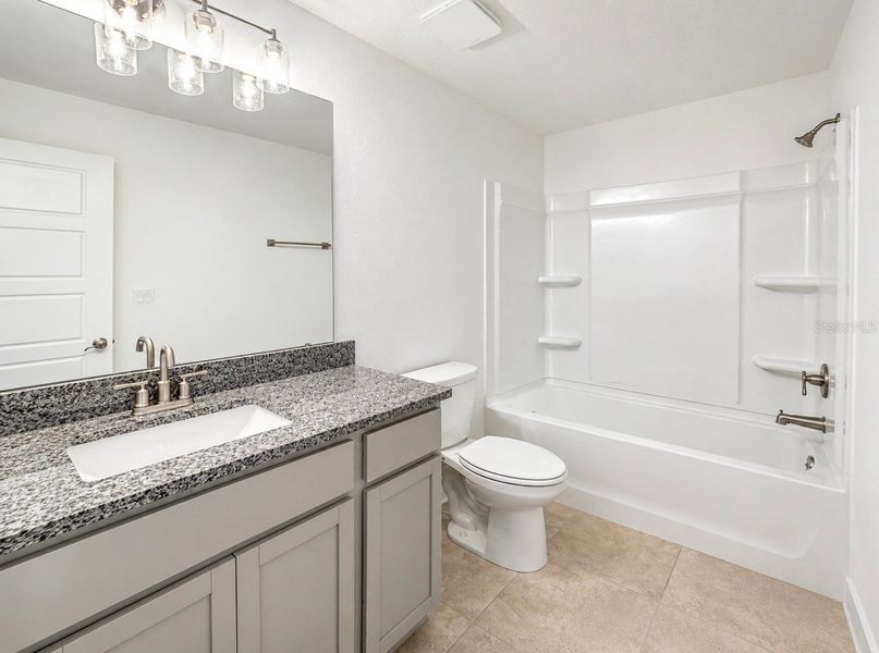 Furnished interior view inside a new home in Harmony Central, Harmony (Image 9).