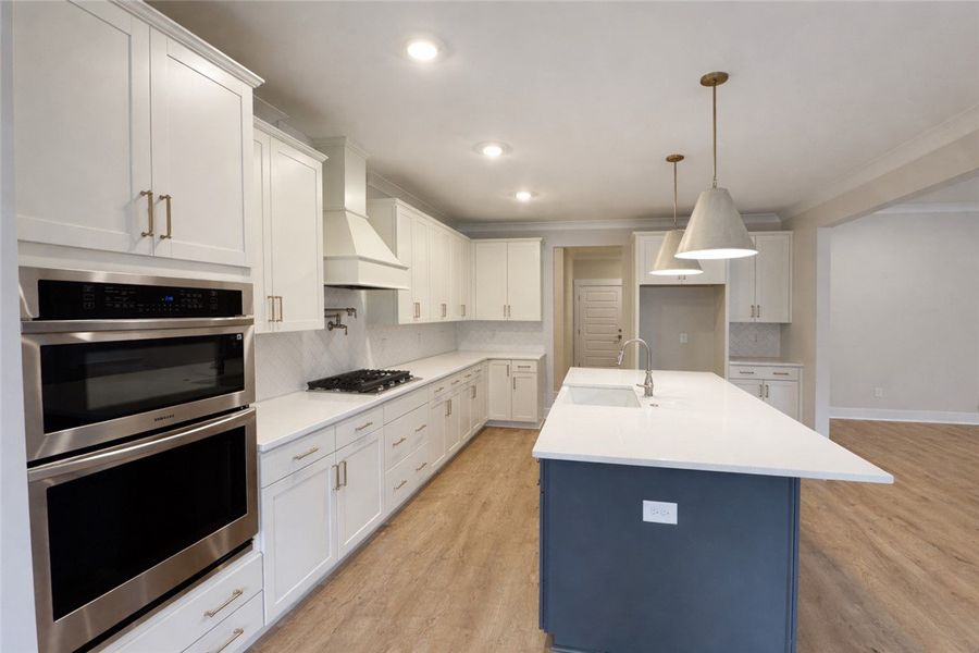 This bright kitchen features sleek appliances and