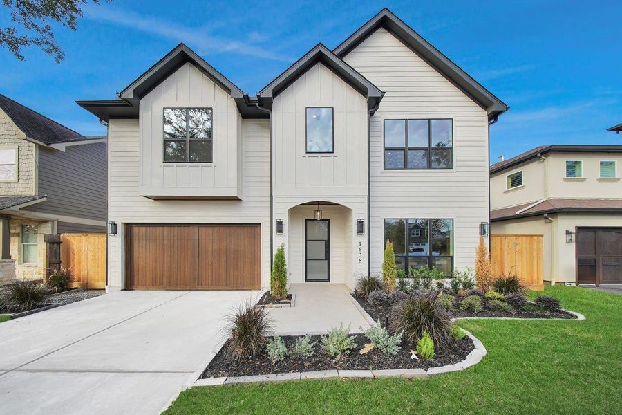 Front exterior of a new home in , Houston, TX, highlighting curb appeal (Image 24).