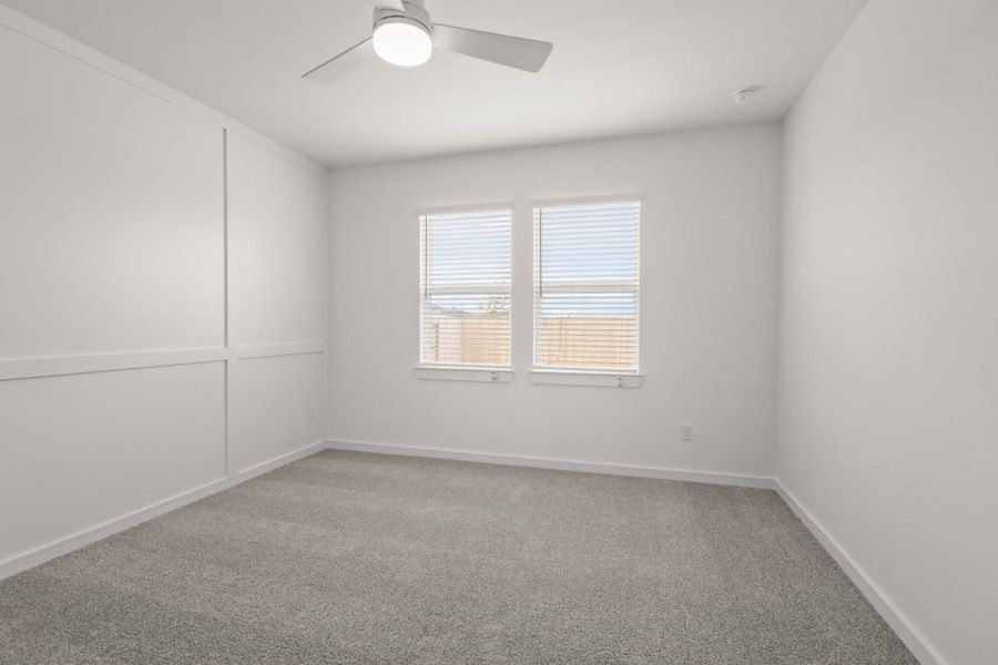 Tranquil primary suite with feature wall Tranquil primary suite with feature wall