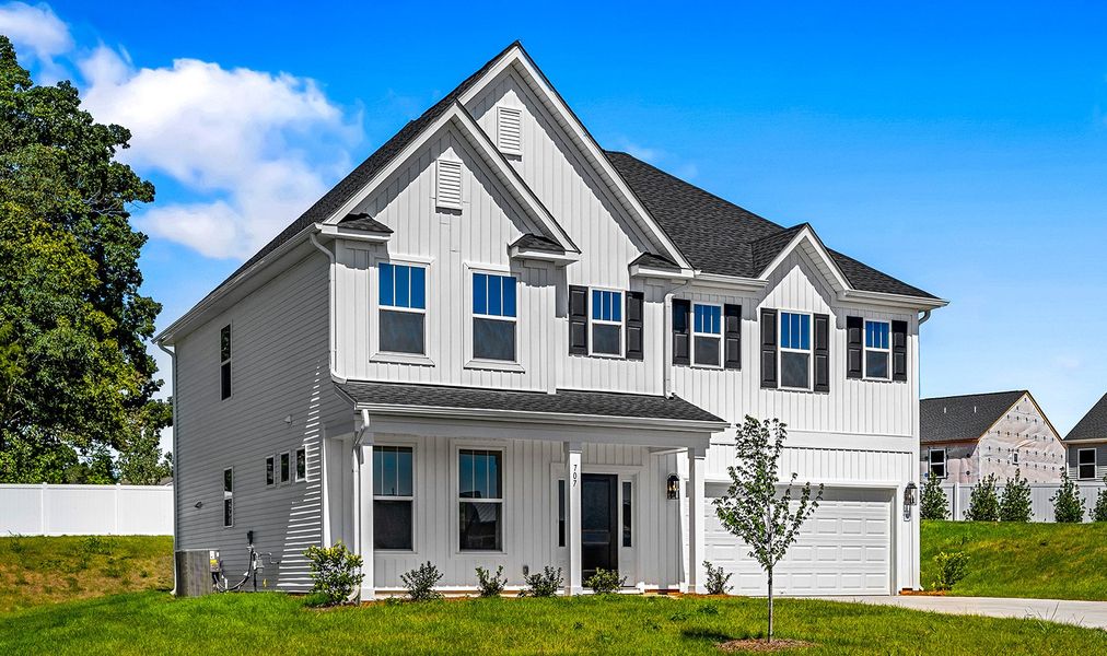 Front exterior of a new home in Hanes Lake, Winston-Salem, NC, highlighting curb appeal (Image 19).