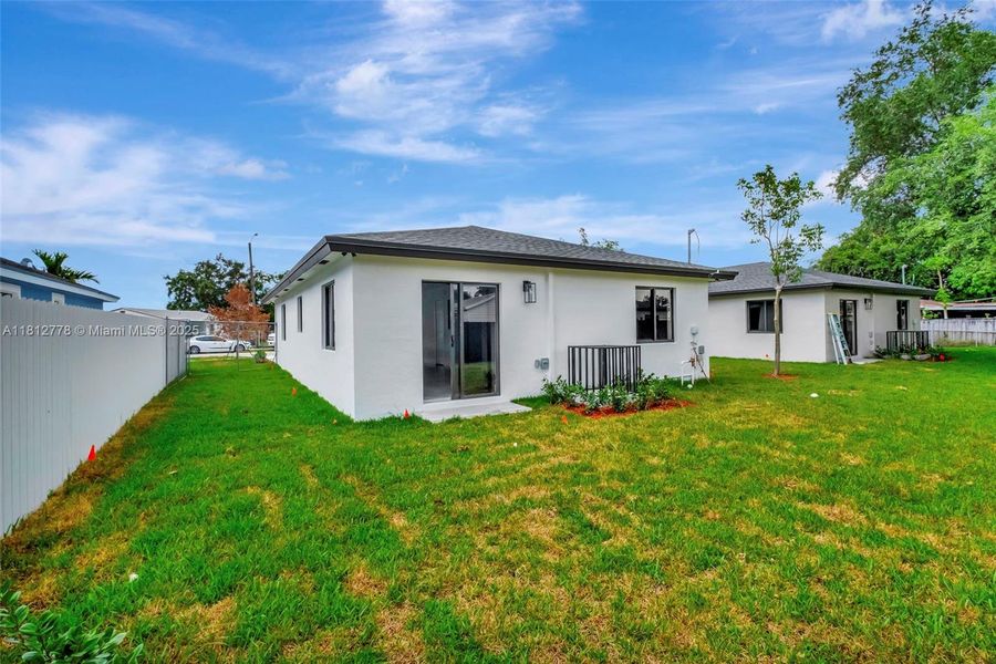 Front exterior of a new home in , Miami Gardens, FL, highlighting curb appeal (Image 9).