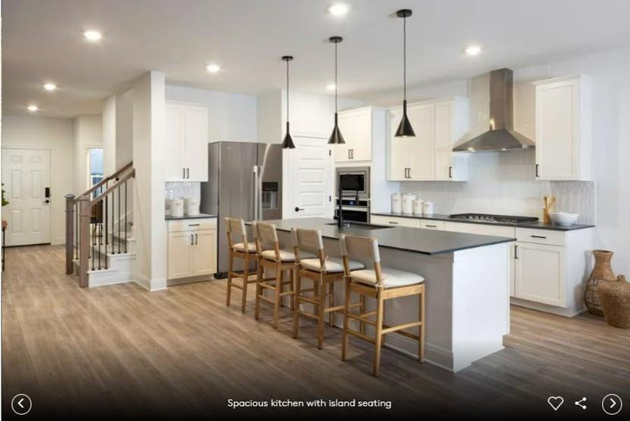 Interior photos- Photo of Pulte model home with same floor plan, not of actual home listed.