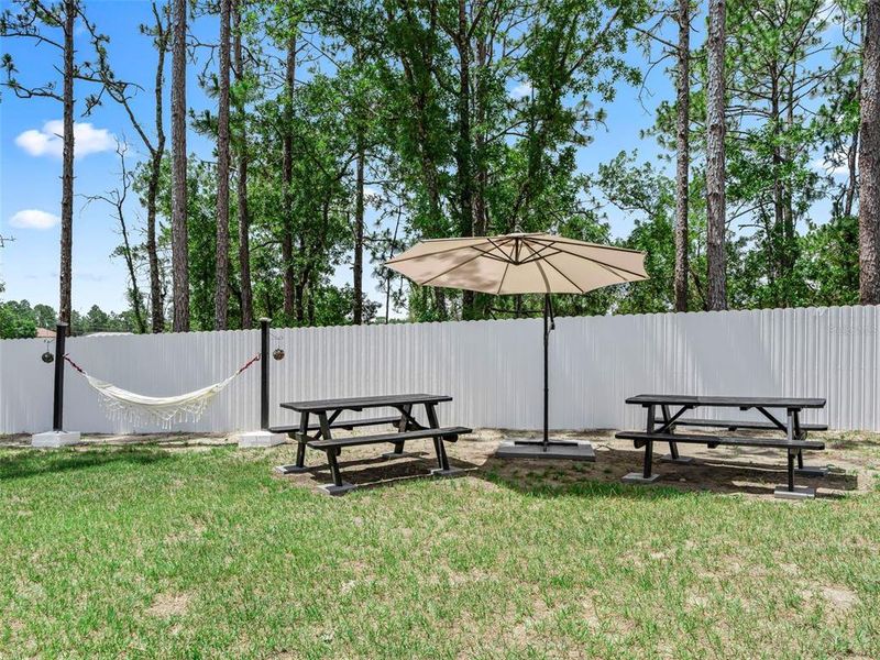 Exterior details and patio area of a home in , Ocala (Image 25).