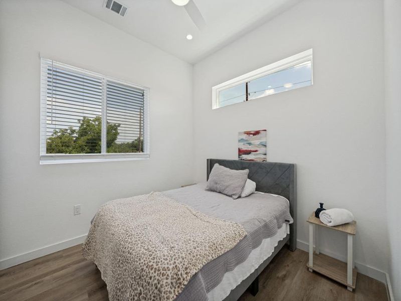 Natural light cascades through well-placed windows, highlighting the durable flooring and clean, minimalist aesthetic. Natural light cascades through well-placed windows, highlighting the durable flooring and clean, minimalist aesthetic.