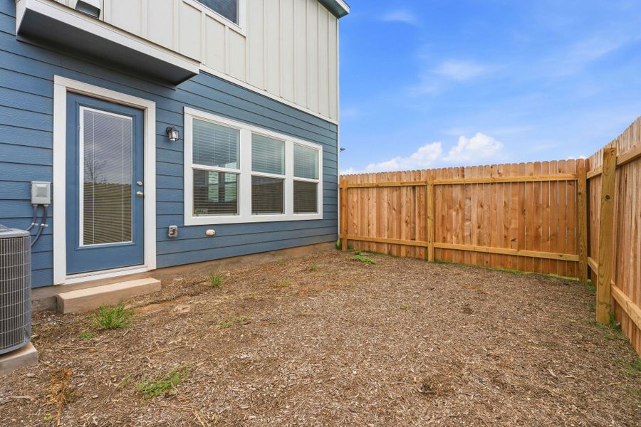Private backyard with new wood fencing Private backyard with new wood fencing