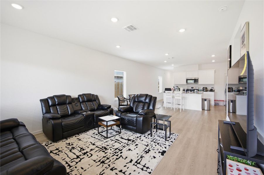 Living area — Bright open-concept living space. Living area — Bright open-concept living space.