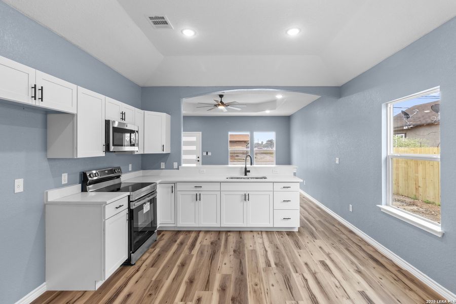 Furnished interior view inside a new home in , San Antonio (Image 8).