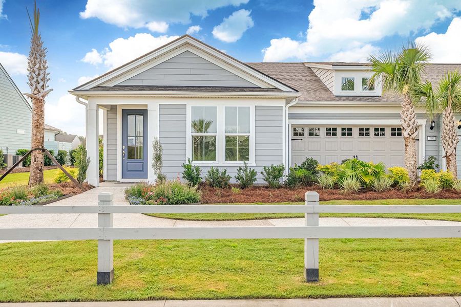 Front exterior of a new home in Sun City Hilton Head, Bluffton, SC, highlighting curb appeal (Image 2). Front exterior of a new home in Sun City Hilton Head, Bluffton, SC, highlighting curb appeal (Image 2).