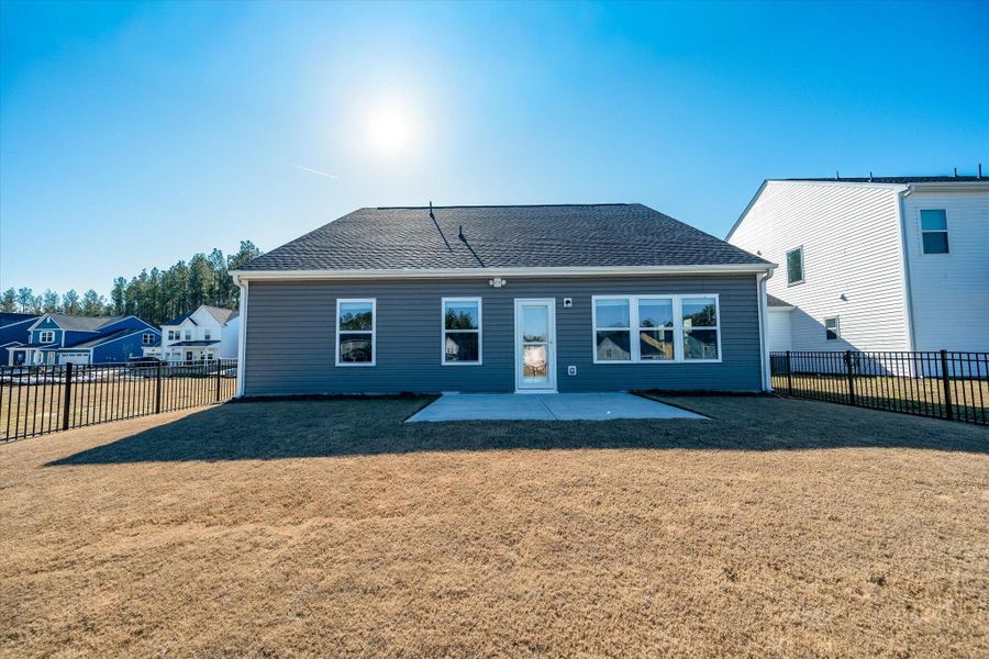 Exterior details and patio area of a home in , Ravenel (Image 22).