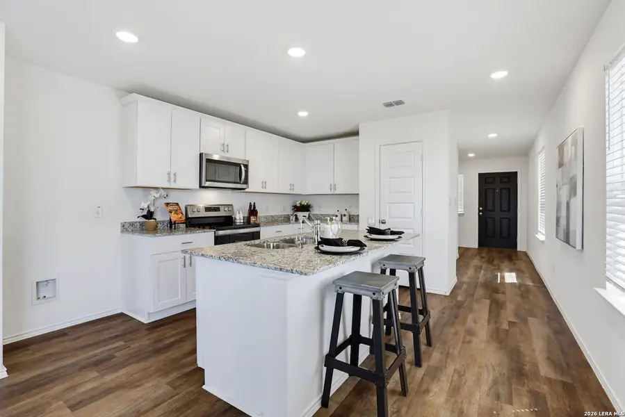 Furnished interior view inside a new home in Cinco Lakes, San Antonio (Image 6).