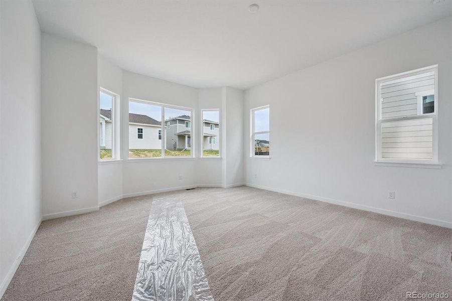 Spacious, unfurnished interior of a new home in The Aurora Highlands, Aurora (Image 21).