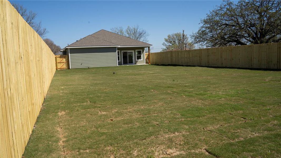 Exterior details and patio area of a home in , Denison (Image 15).