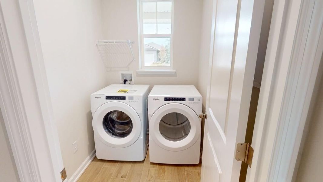 Furnished interior view inside a new home in RiverTown - Forest, St. Johns (Image 5).