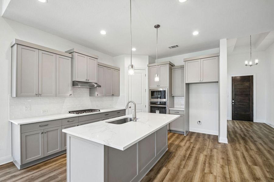 Furnished interior view inside a new home in 6 Creeks, Kyle (Image 6).