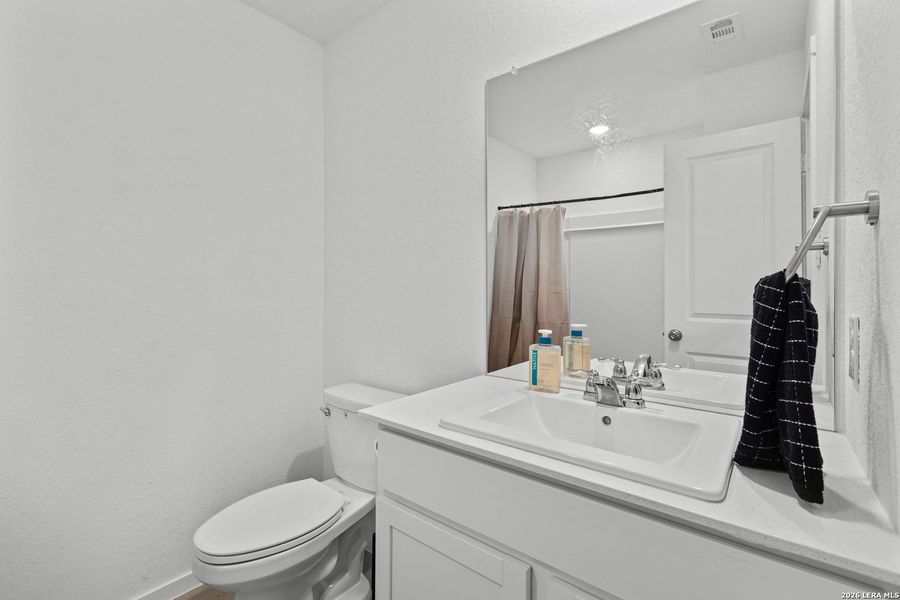 Furnished interior view inside a new home in Torian Village, San Antonio (Image 11).