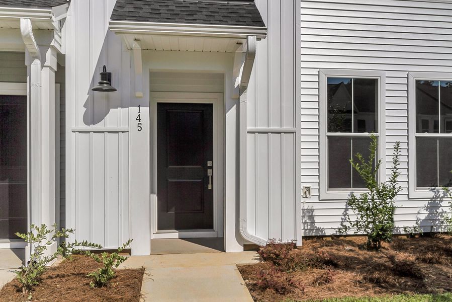 Exterior details and patio area of a home in Six Oaks, Summerville (Image 17).