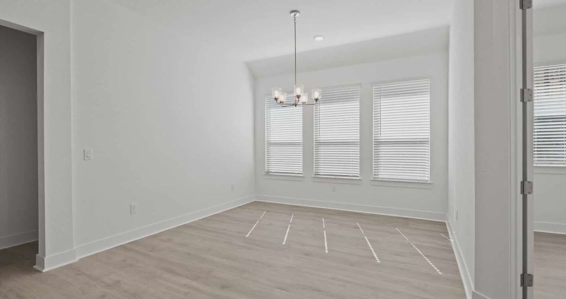Representative unfurnished interior of a home built from the Samantha by Chesmar Homes in Village at Three Oaks, Seguin (Image 9).