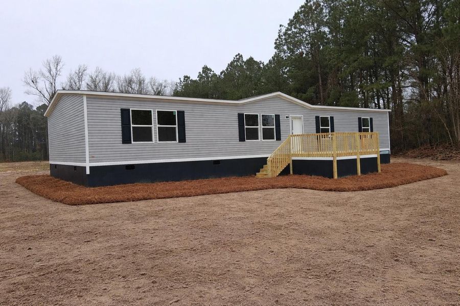 Exterior details and patio area of a home in , Holly Hill (Image 9).