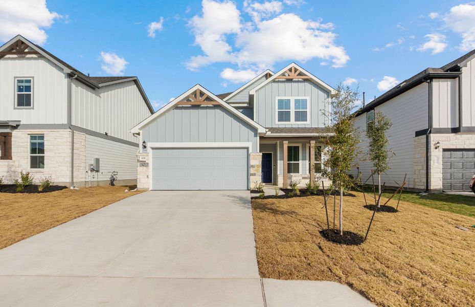 Front exterior of a new home in Patterson Ranch, Georgetown, TX, highlighting curb appeal (Image 20).