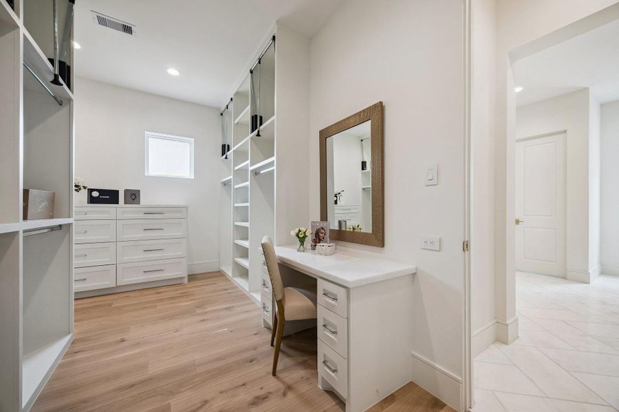 Built-in vanity in the second primary closet. **Photo is of another home in the community and for information purposes only. Buyer to verify all details.** Built-in vanity in the second primary closet. **Photo is of another home in the community and for information purposes only. Buyer to verify all details.**