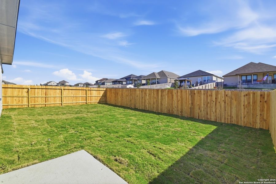 Exterior details and patio area of a home in Hunters Ranch, San Antonio (Image 24).