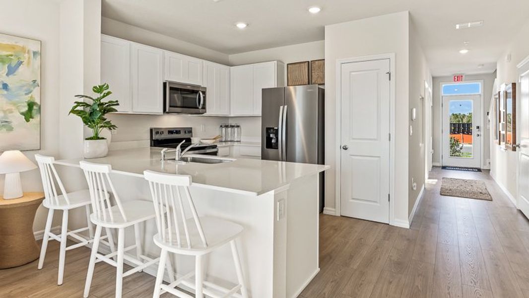 Representative furnished interior of a home built from the Pearson B by D.R. Horton in Townes at Island Lake, Pinellas Park (Image 8).